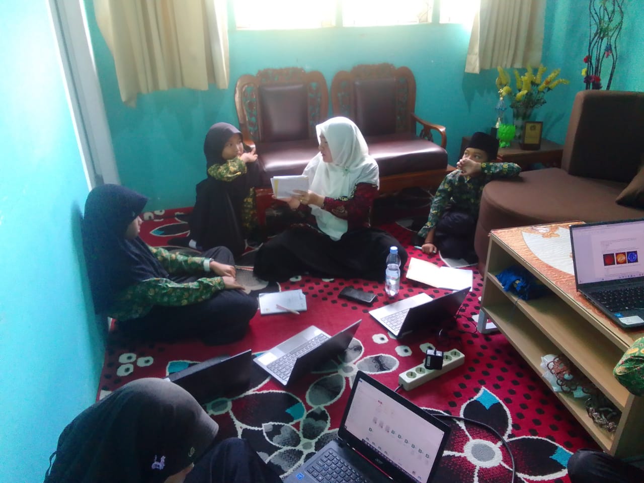 EFI MARLINA, S.Pd.I, GURU PEMBIMBING OMI